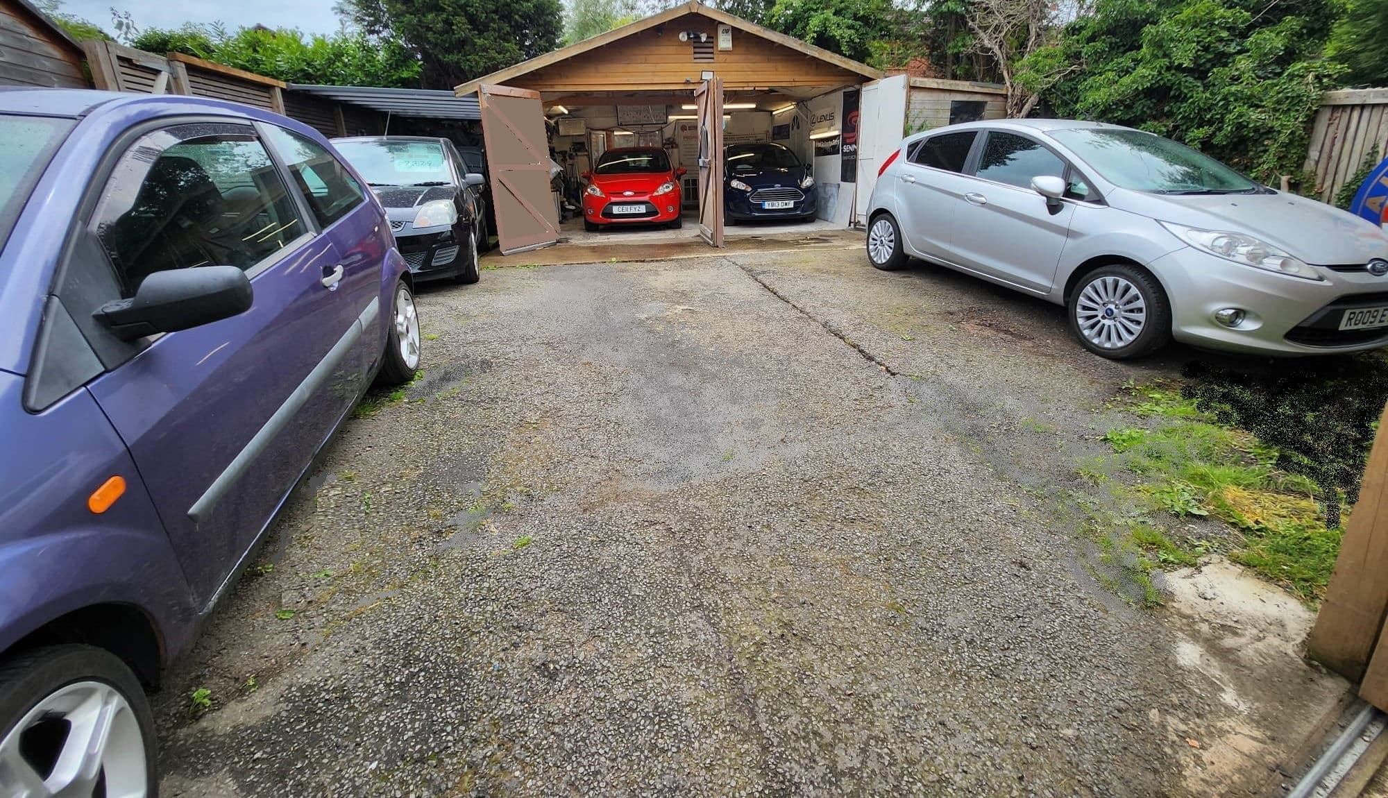 Dealer garage and walkaround car